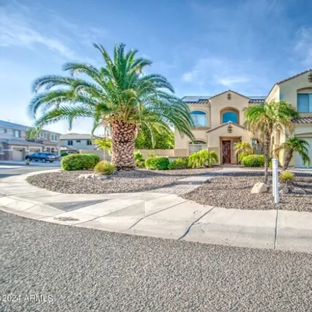 Buy this 5 bed house on 5012 West Range Mule Drive in Phoenix, AZ 85083