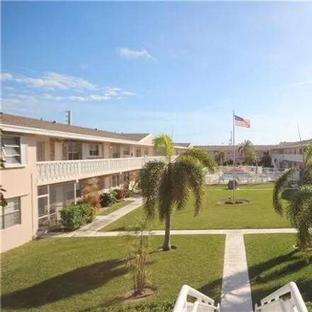 Rent this 2 bed condo on 2001 NE 38th St Apt 9 in Lighthouse Point, Florida