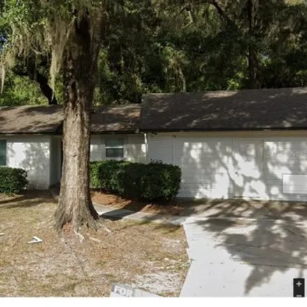 Buy this 4 bed house on 5598 Southwest 82nd Terrace in Alachua County, FL 32608