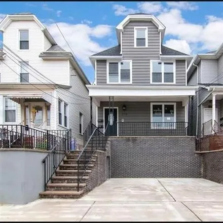 Rent this 2 bed townhouse on 719 Avenue E in Bayonne, NJ 07002