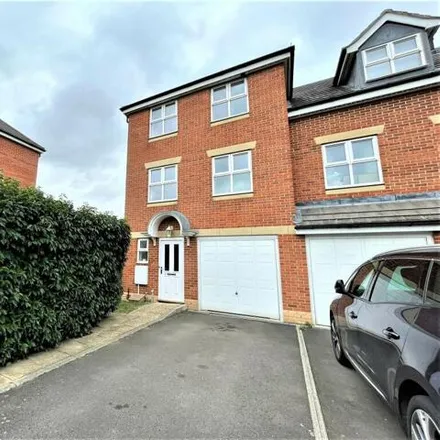 Rent this 4 bed townhouse on Britannia Iron Works Entrance in Usher Close, Bedford