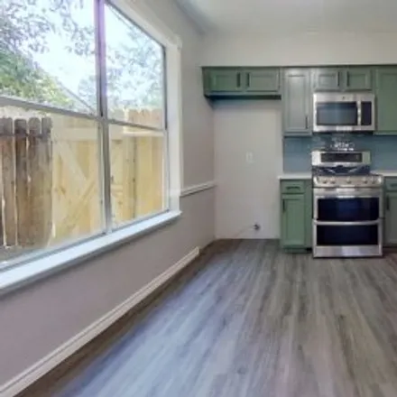 Rent this 3 bed apartment on 5110 Shady Gardens Drive in Elm Grove Village, Houston