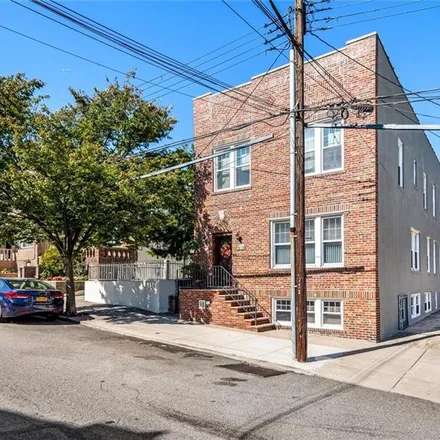 Buy this 5 bed townhouse on 75-37 67th Road in New York, NY 11379