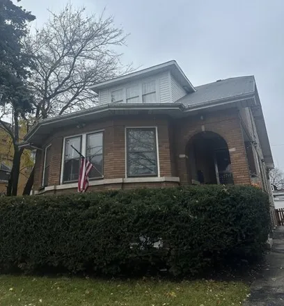 Buy this 5 bed house on 4946 West Schubert Avenue in Chicago, IL 60639