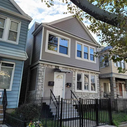 Rent this 2 bed townhouse on 9 Wade Street in Greenville, Jersey City