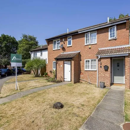 Rent this 2 bed townhouse on Brambles Farm Drive in London, UB10 0DT