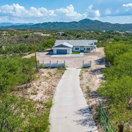 Buy this 4 bed house on 1099 Fuego Court in Santa Cruz County, AZ 85648