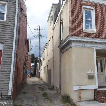 Buy this 4 bed townhouse on 424 South Washington Street in Baltimore, MD 21231