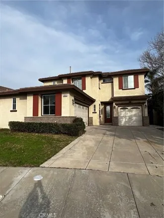 Rent this 5 bed house on 6982 Tailwind Lane in Fontana, CA 92336