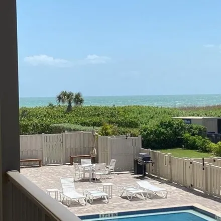 Rent this 2 bed condo on 265 Marion Lane in Cocoa Beach, FL 32931