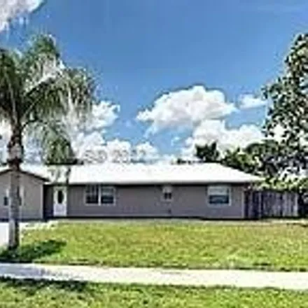 Buy this 4 bed house on 826 Hibiscus Drive in Royal Palm Beach, Palm Beach County