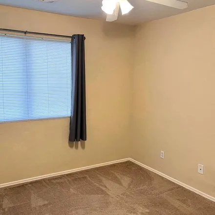 Rent this 3 bed apartment on 17272 West Durango Street in Goodyear, AZ 85338