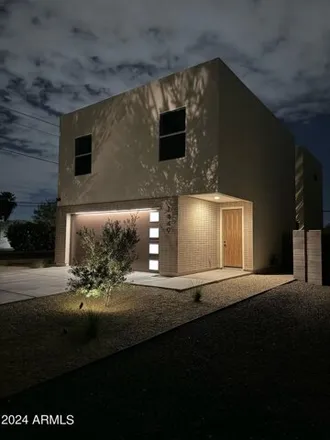 Buy this 4 bed house on 1449 E Hoover Ave in Phoenix, Arizona