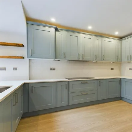 Rent this 4 bed townhouse on 22 Sterne Street in London, W12 8AB