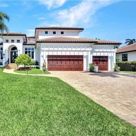 Buy this 5 bed house on 445 Putter Point Drive in Naples, FL 34103