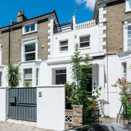 Rent this 5 bed townhouse on 9 Greville Road in London, NW6 5HZ