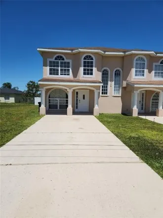 Rent this 3 bed townhouse on 735 Bluebill Place in Polk County, FL 34759