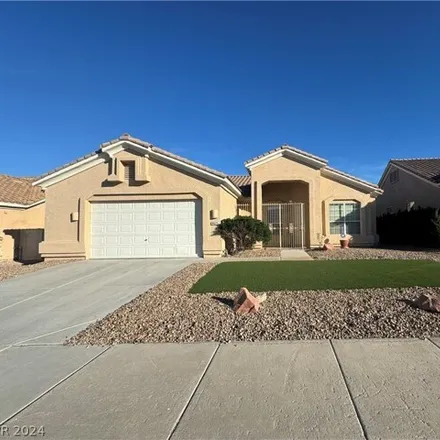 Rent this 4 bed house on 8647 Desert Bird Drive in Las Vegas, NV 89145