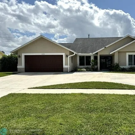 Rent this 4 bed house on Oleaster Avenue in Wellington, FL 33414