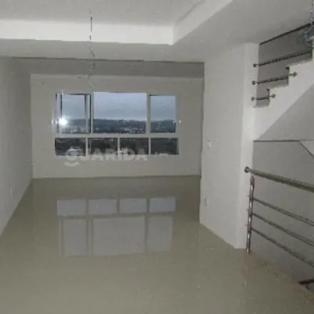 Rent this 3 bed house on Rua Torre de Pedra in Espírito Santo, Porto Alegre - RS
