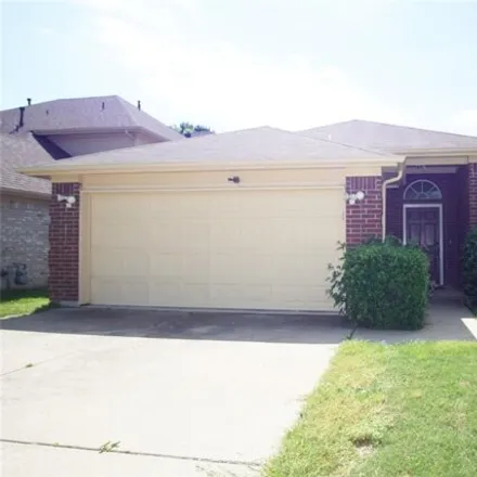 Rent this 4 bed house on 663 Woodacre Drive in Grand Prairie, TX 75052