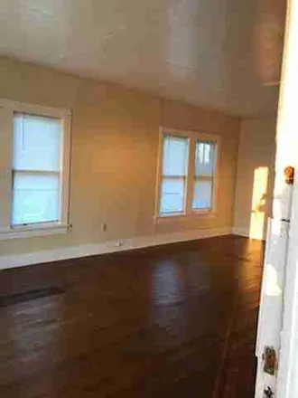 Rent this 3 bed house on 1702 Stillman Ave