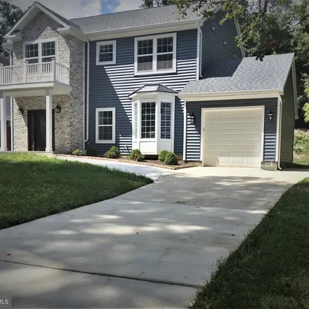 Rent this 4 bed house on 7112 Woodley Lane in West Falls Church, VA 22042