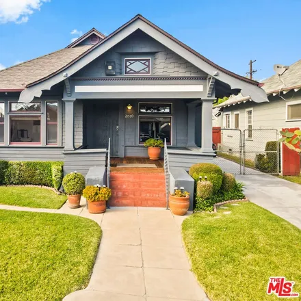 Buy this 4 bed house on 2069 West 30th Street in Los Angeles, CA 90018