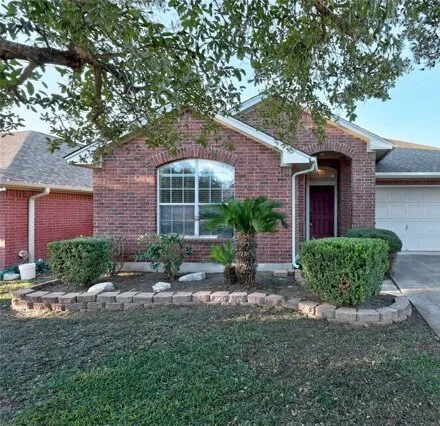 Rent this 3 bed house on 1604 Bush Coat Ln in Austin, Texas