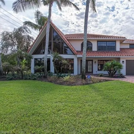 Rent this 3 bed house on 10945 Vanderbilt Drive in Pelican Bay, FL 34108