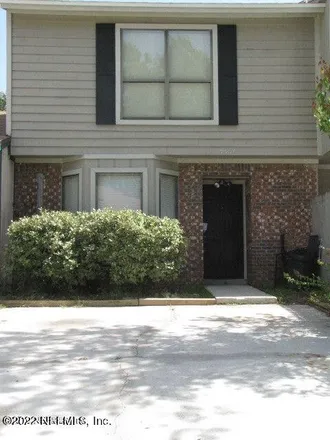 Rent this 2 bed townhouse on 5556 Cabot Drive North in Wesconnett, Jacksonville