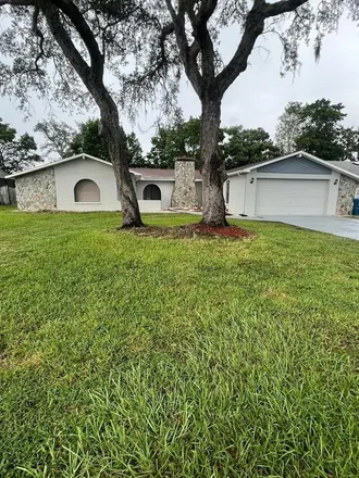 Buy this 3 bed house on 8139 Wooden Drive in Spring Hill, FL 34606