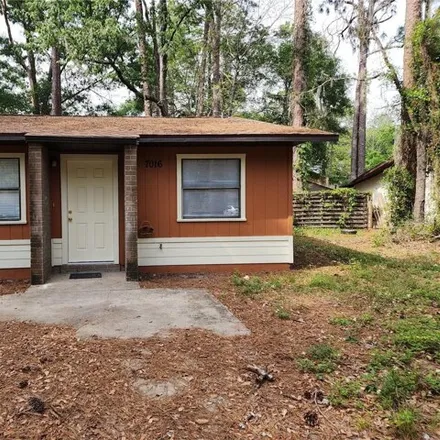 Rent this 2 bed apartment on 7012 Southwest 18th Place in Alachua County, FL 32607