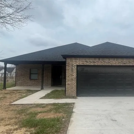 Buy this 4 bed house on 1082 Pearl Harbor St in Tool, Texas