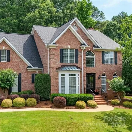 Buy this 4 bed house on 13402 Darby Chase Drive in Charlotte, NC 28277