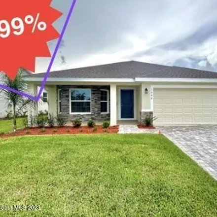 Buy this 3 bed house on Middlebury Drive Southeast in Palm Bay, FL
