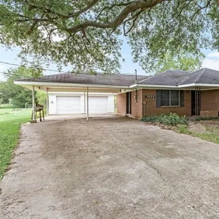 Buy this 3 bed house on 1575 Dugat Road in Winnie, TX 77665