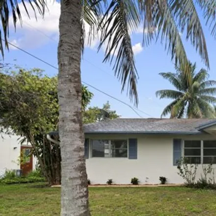 Buy this 4 bed house on 776 Northwest 8th Avenue in Boynton Beach, FL 33426