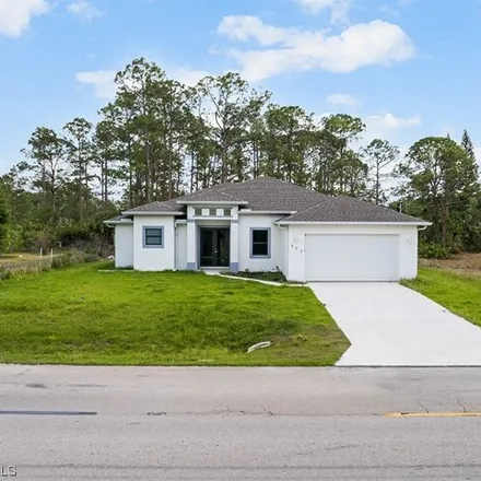 Buy this 3 bed house on 870 East 5th Street in Lehigh Acres, FL 33972