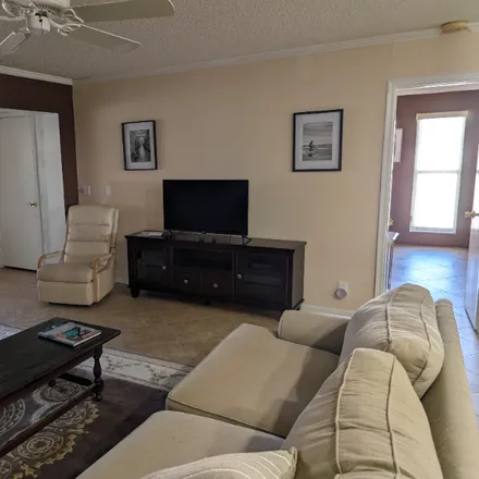 Rent this 2 bed condo on 1710 nw 18th ave