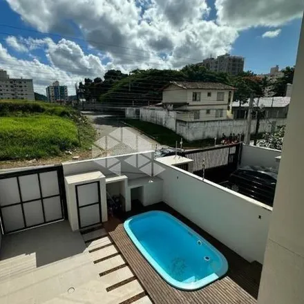 Buy this 3 bed house on Rua Guamirim in Tabuleiro, Camboriú - SC