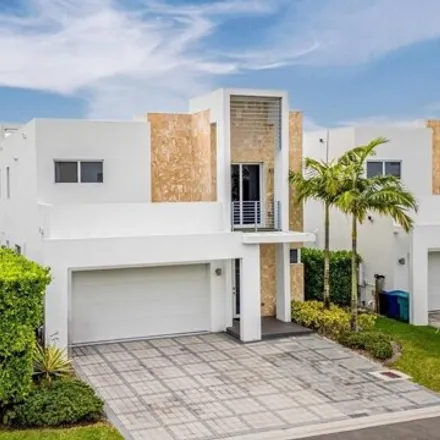 Buy this 4 bed house on 10300 Northwest 68th Street in Doral, FL 33178