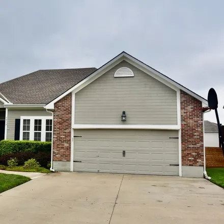 Buy this 4 bed house on 1512 Southeast Dalton Drive in Lee's Summit, MO 64081