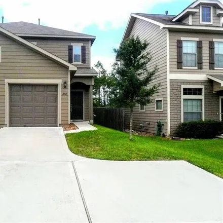 Rent this 2 bed house on 291 Woodland Hills Drive in Conroe, TX 77303