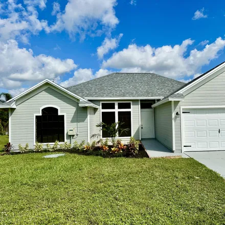 Buy this 3 bed house on 241 Southwest Inwood Avenue in Port Saint Lucie, FL 34984