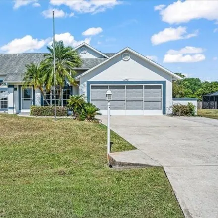 Buy this 3 bed house on 1250 Campo Avenue Northwest in Palm Bay, FL 32907