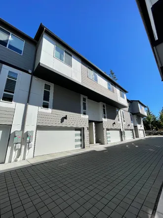 Rent this 3 bed townhouse on 21525 50th Ave. W