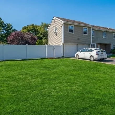 Buy this 8 bed townhouse on 51 Vidoni Drive in Mount Sinai, NY 11766