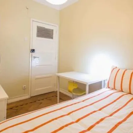 Rent this 4 bed room on Rua Damasceno Monteiro 59 in 1170-108 Lisbon, Portugal