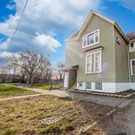 Buy this 4 bed house on 411 West 61st Street in Chicago, IL 60636